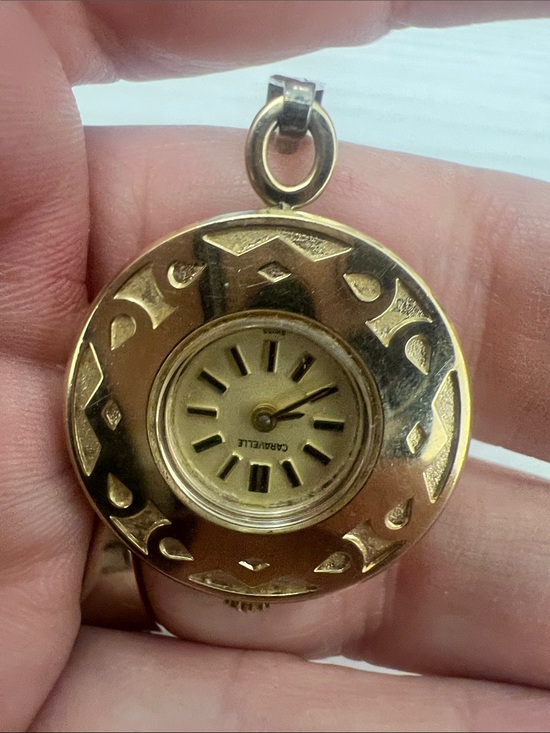 Caravelle Gold-Tone Round Pendant Watch with Tassel Charm